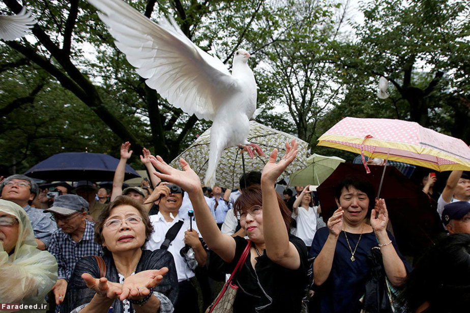 رها کردن کبوتر به نشانه صلح در توکیو